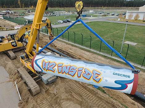 Hydrogen tube 'H2 inside' graffiti